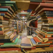 Books arranged in a tunnel formation in a book store.