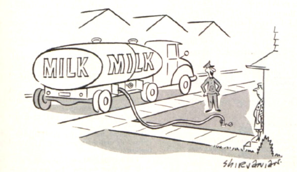 Milkman delivers milk from a giant tanker.