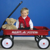 Troy Brownfield's son Conner in a Radio Flyer toy wagon