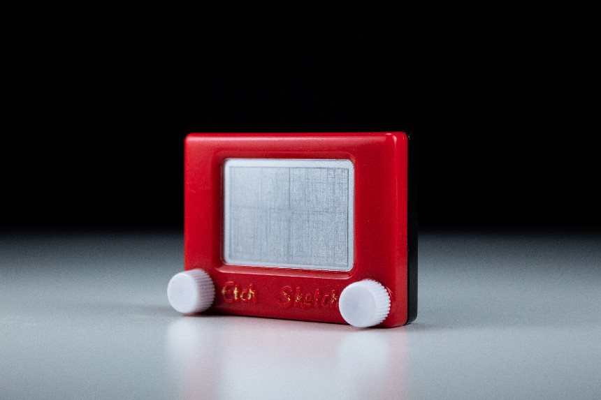 A small Etch-a-Sketch toy