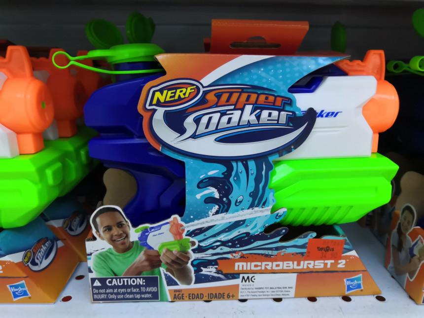 A Super Soaker water gun on a store shelf