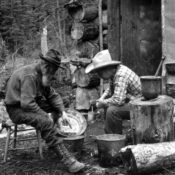 A pair of prospectors sorting through stones during the 1849 California Gold Rush