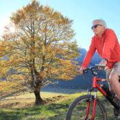 Older man on a bike.