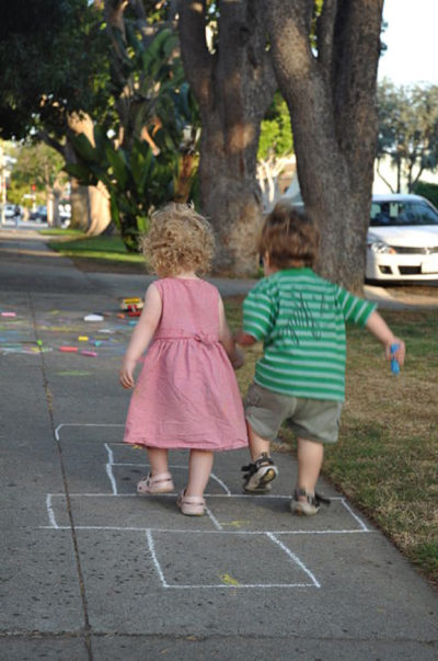Toddlers playing hopscotch