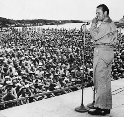 Bob Hope entertaining troops during a World War II USO Camp show