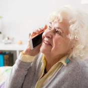 Older lady talking on a smart phone