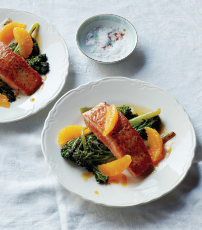 Plates of Salmon with Grilled Broccolini and Orange Sauce