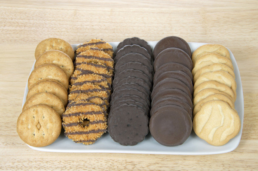 A tray filled with various types of Girl Scouts' cookies