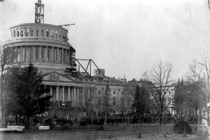 Photo of Abraham Lincoln's first inauguration, in front of an incomplete Capitol Dome