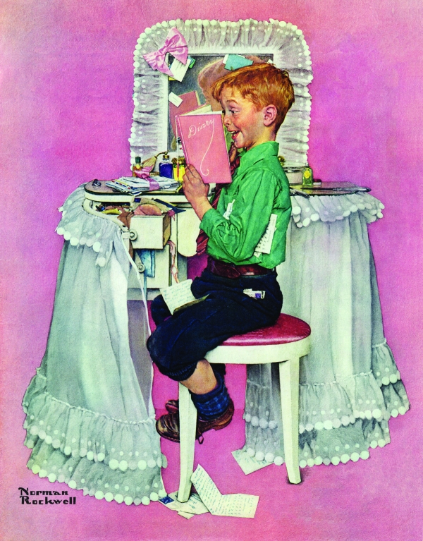 Young boy reads his sisters diary at her dressing table.