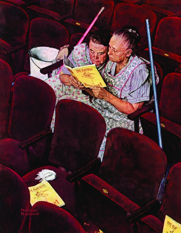 Cleaning ladies reading a book in an empty theater