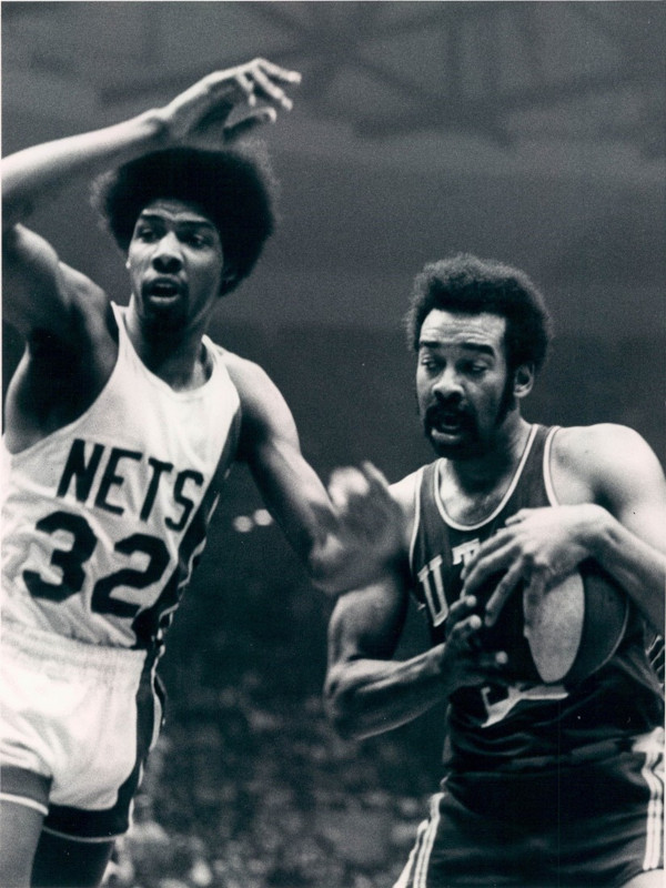 Basketball players Willie Wise and Julius Erving