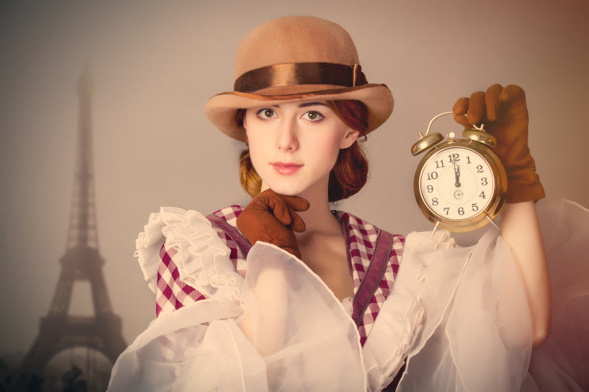 Woman holding clock