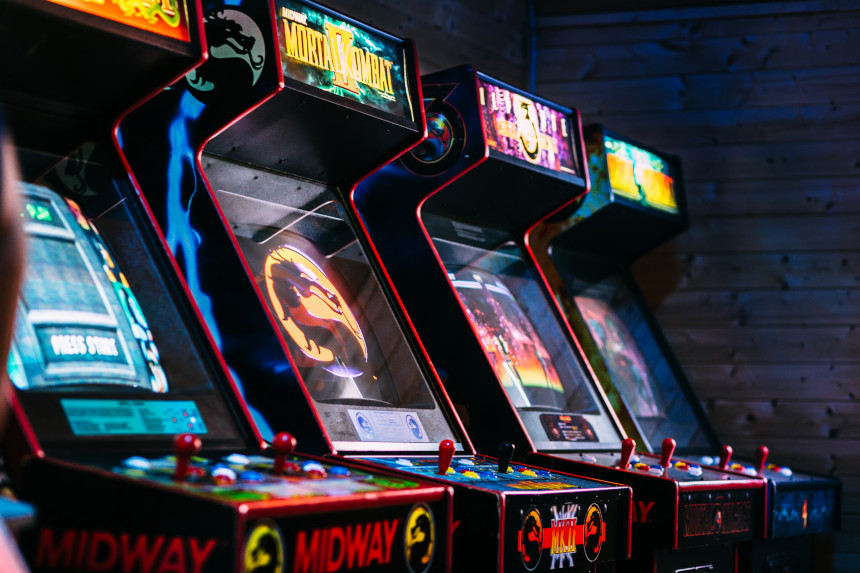 A row of classic Mortal Kombat arcade machines