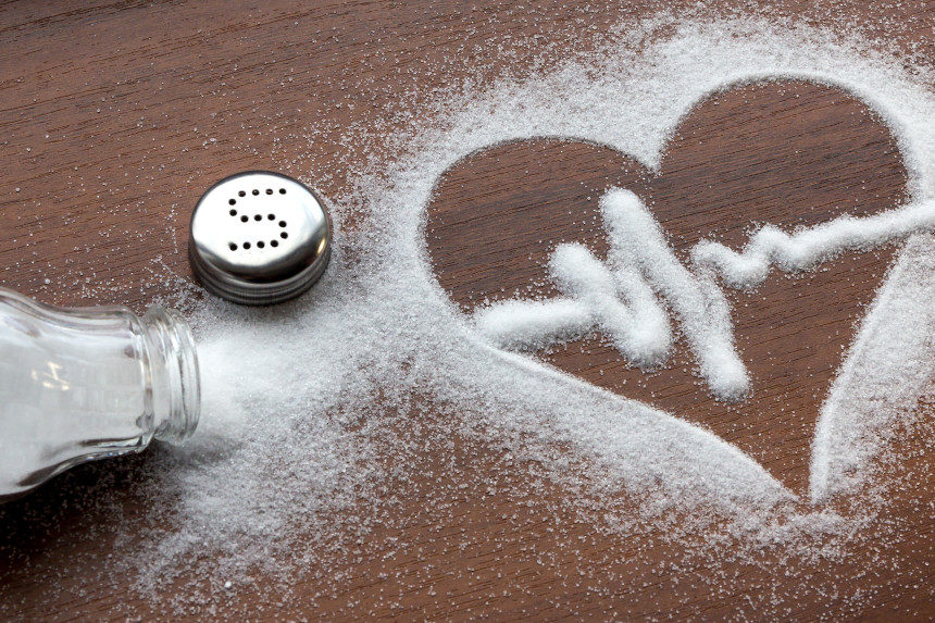 Salt used to shape a heart on a countertop