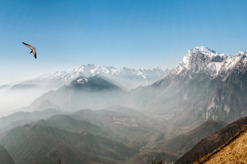 Hang glider over mountains