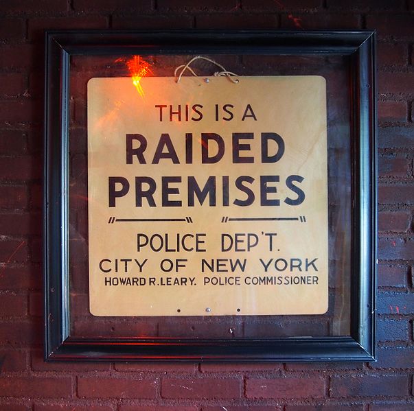 Sign left by police after they raided the Stonewall Inn