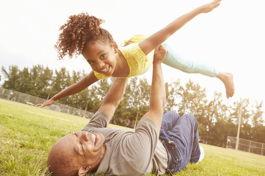 Grandfather playing with granddaughter