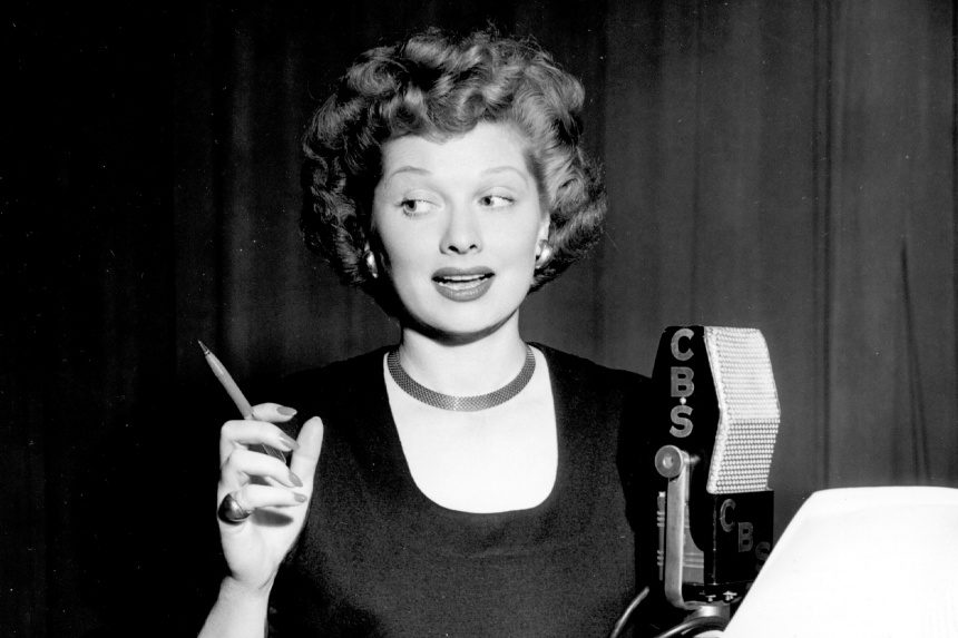 Lucille Ball performing in a radio booth