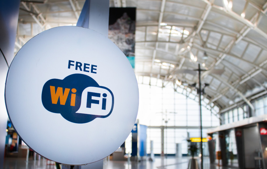 Sign in an airport advertising free public wi-fi network.
