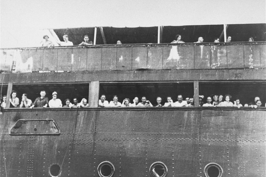 Jewish refugees look out aboard the MS St. Louis