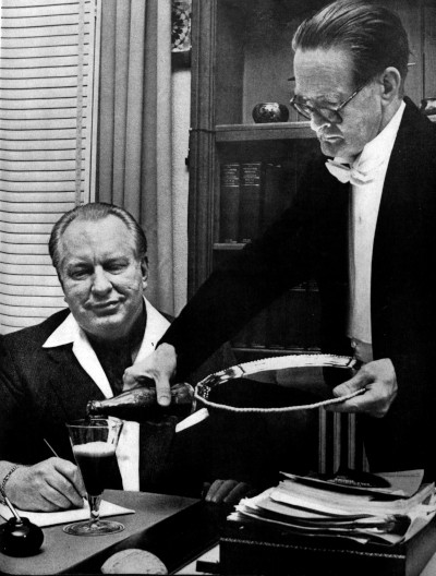 L. Ron Hubbard's butler pouring him a coca-cola.