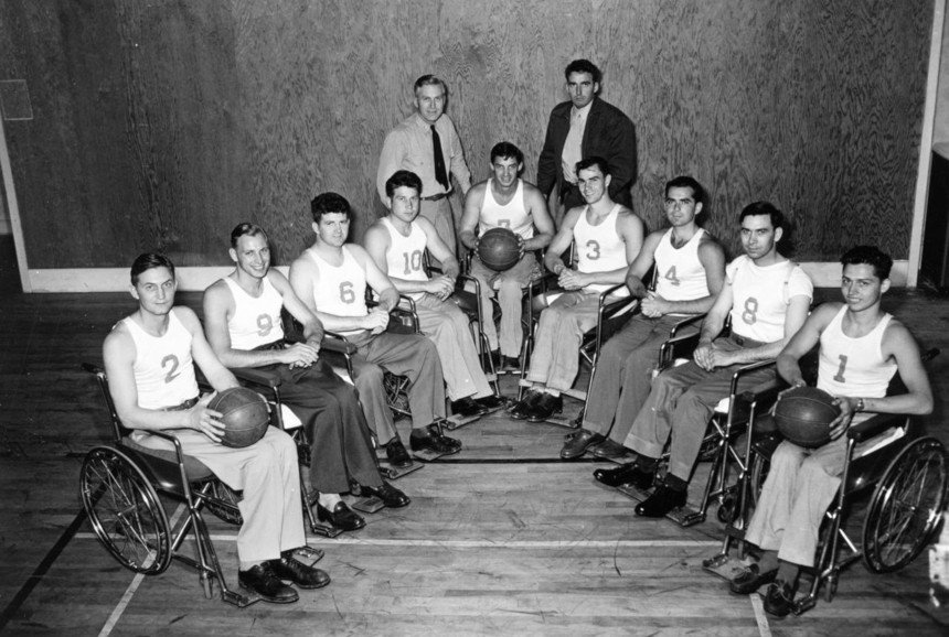 The Rolling Devils basketball team pose for a photo.