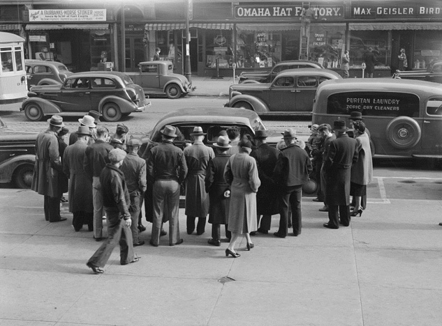 Necktie Salesman with a crowd of potential shoppers