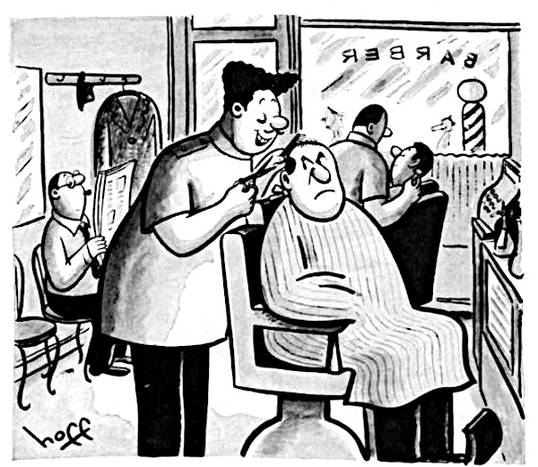 Balding man getting a haircut