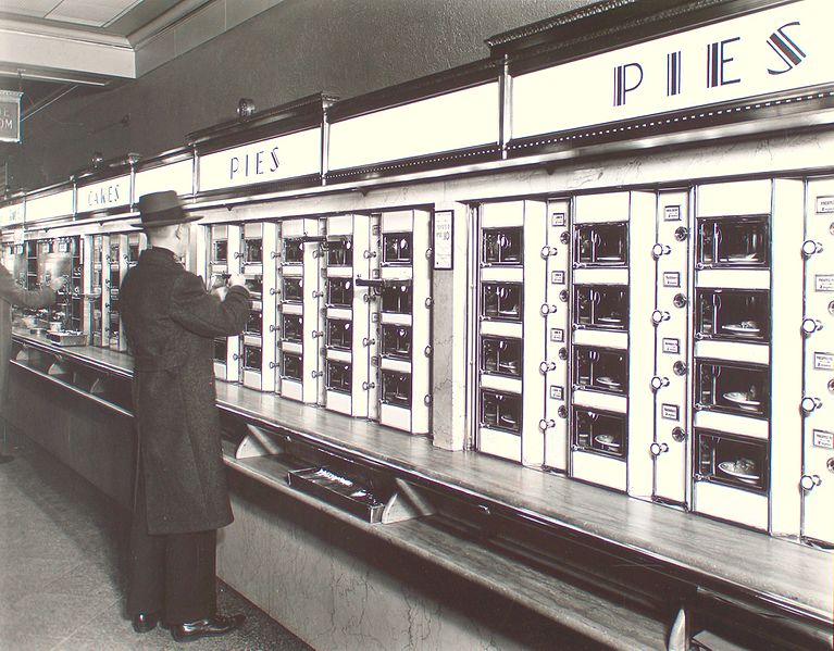 Man choosing a food from an automat