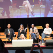 Cast members from Star Trek: The Next Generation at a convention panel.