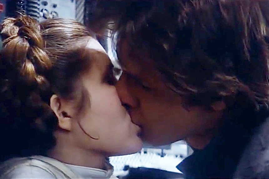 Carrie Fisher and Harrison Ford kissing in The Empire Strikes Back