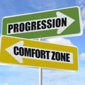 Signs that read "Progression" and "Comfort Zone"