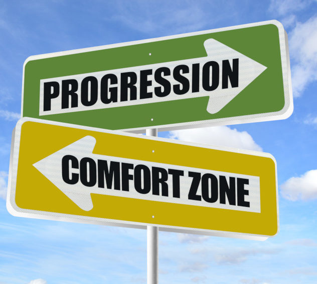 Signs that read "Progression" and "Comfort Zone"
