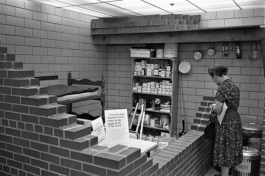 Woman building a bomb shelter in her basement