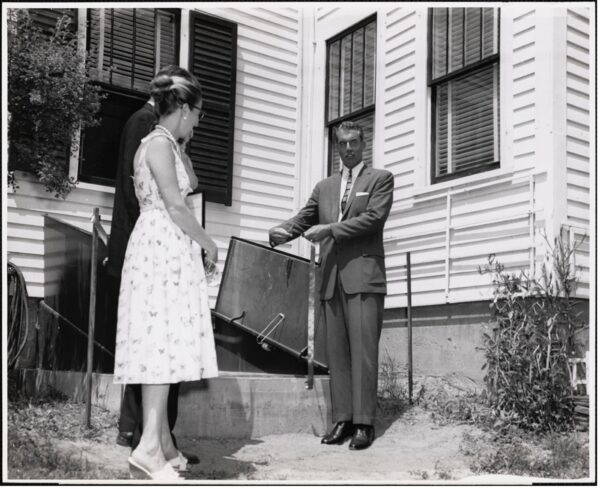 Salesman hawking bomb shelters to a couple