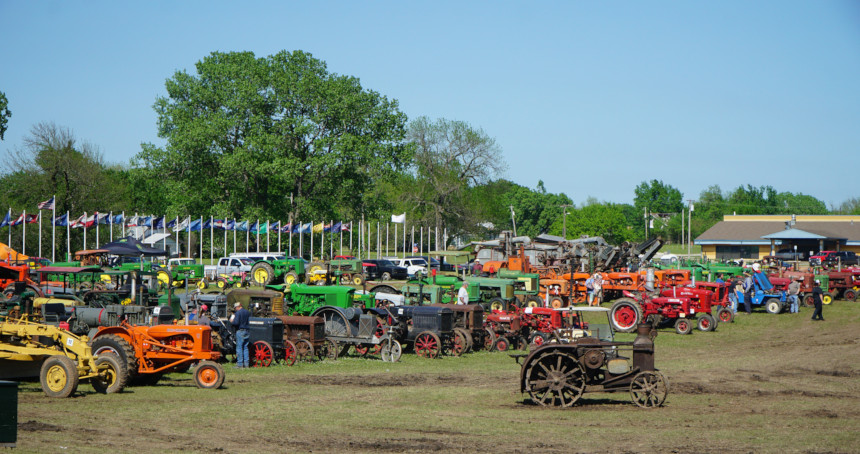 Rows of tractors at the Oklahoma Steam Threshers and Gas Engine Association show
