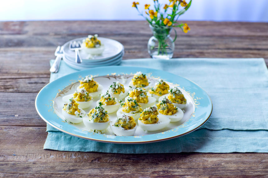 Plate of herbed deviled eggs