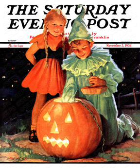 Two young siblings putting a candle inside a Jack-o-Lantern.
