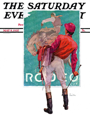A jockey looks at a poster.