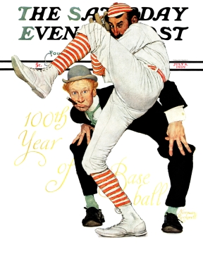 Pitcher winds up while ump looks on