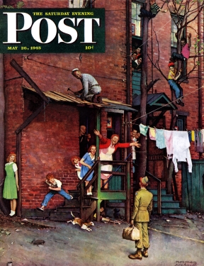 Soldier in alley as family and neighbors welcome him