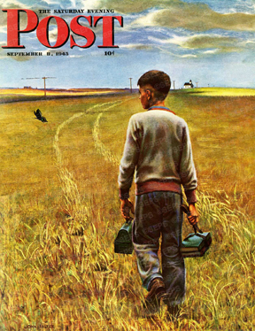 Country boy walking to school through field of grain