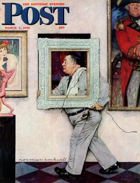 Museum worker carrying picture frame