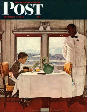 Boy in train dining car figures tip for waiter