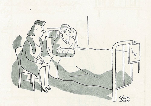 Injured man speaks to his wife as she sits next to his hospital bed.