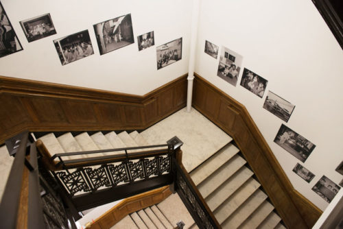 Staircase with photos along the walls.