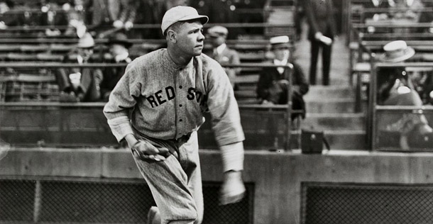 Babe Ruth pitching in a Red Sox uniform.