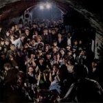 In Liverpool's subterranean Cavern Club, where the Beatles were discovered, a group called the Escorts wows a Saturday afternoon audience of teenagers. "The Return of the Beatles," The Saturday Evening Post. August 8, 1964