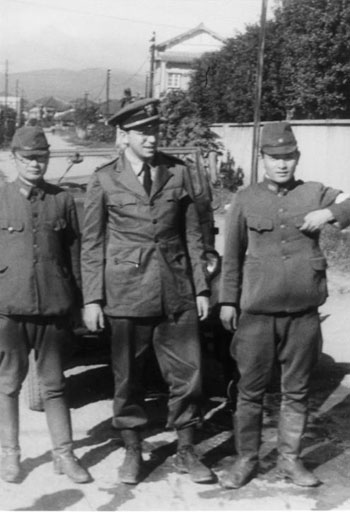 SerVaas (center) served in the China theatre in World War II as a commanding naval officer.